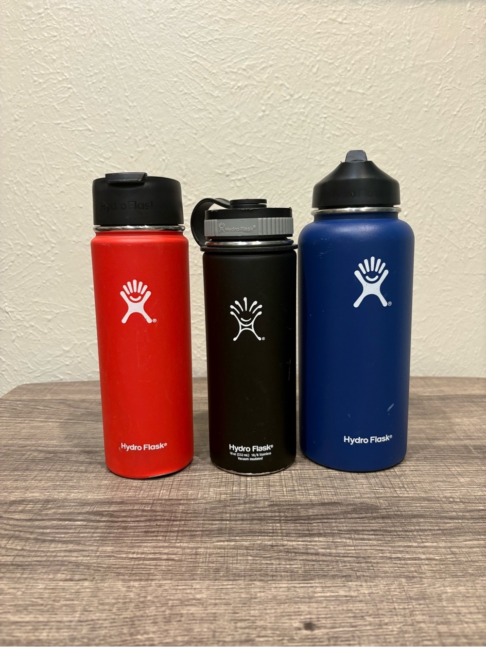 Hydro Flask Trio - Red, Black, Blue Stainless Bottles